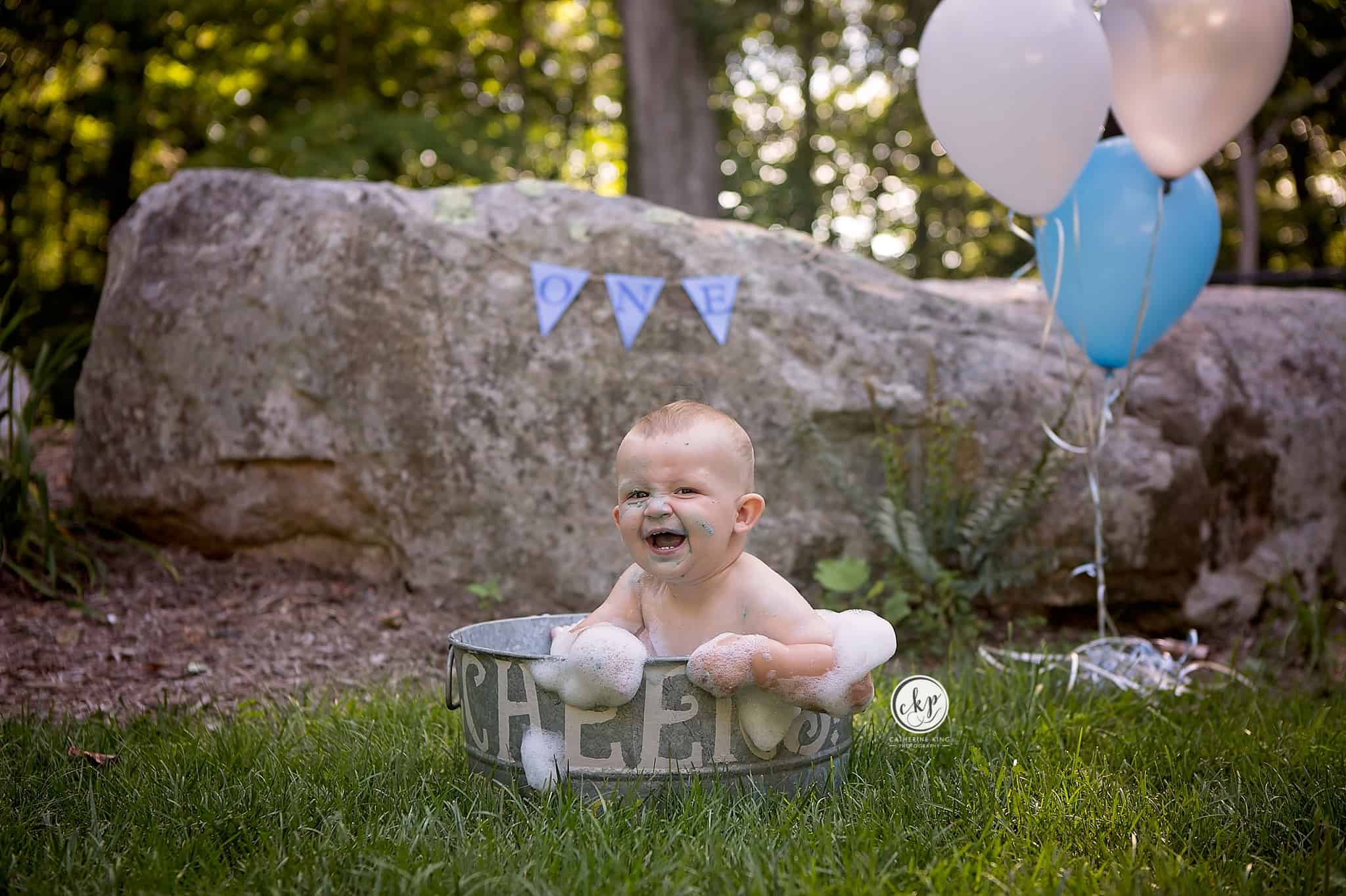 1 year birthday cake smash photography session with Brody
