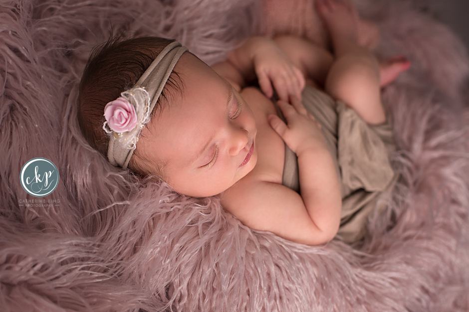 Linnea adorable newborn during her newborn photography session in ct 1