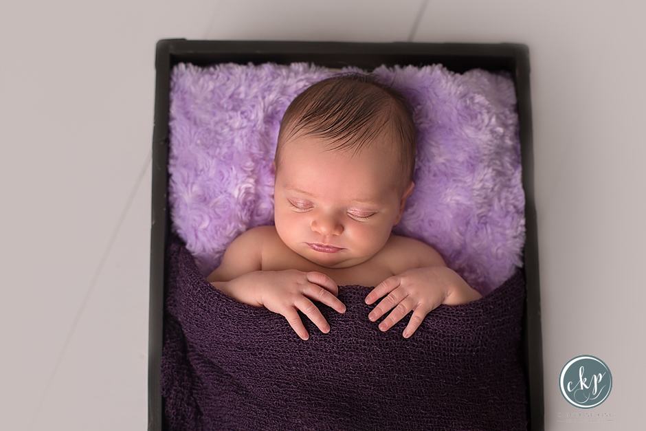 Linnea adorable newborn during her newborn photography session in ct 