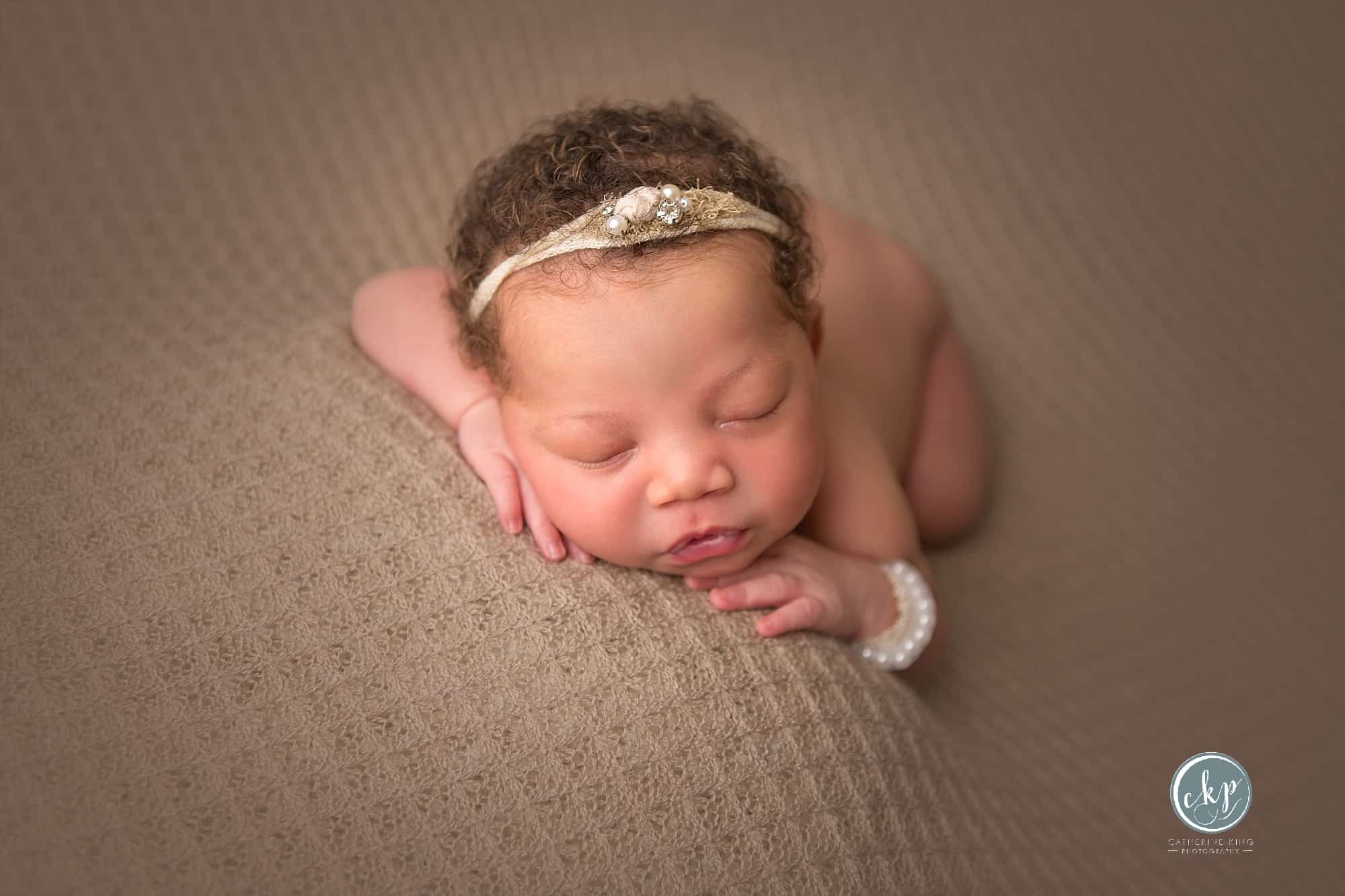 Breighlyn, 7 day old baby in madison ct studio photographed by catherine king photography a ct newborn phtoographer