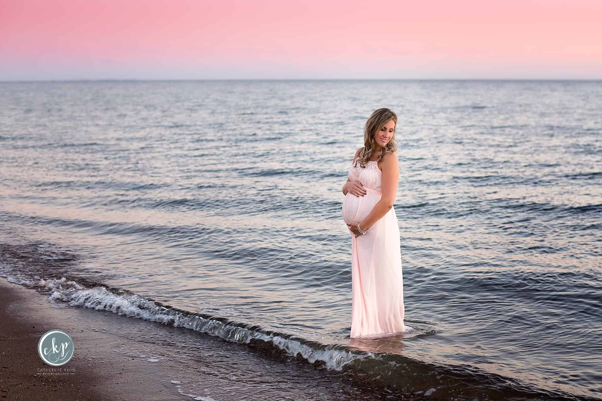 fine art maternity photgoraphy session on the ct shoreline beach with catherine king photography a ct maternity photographer