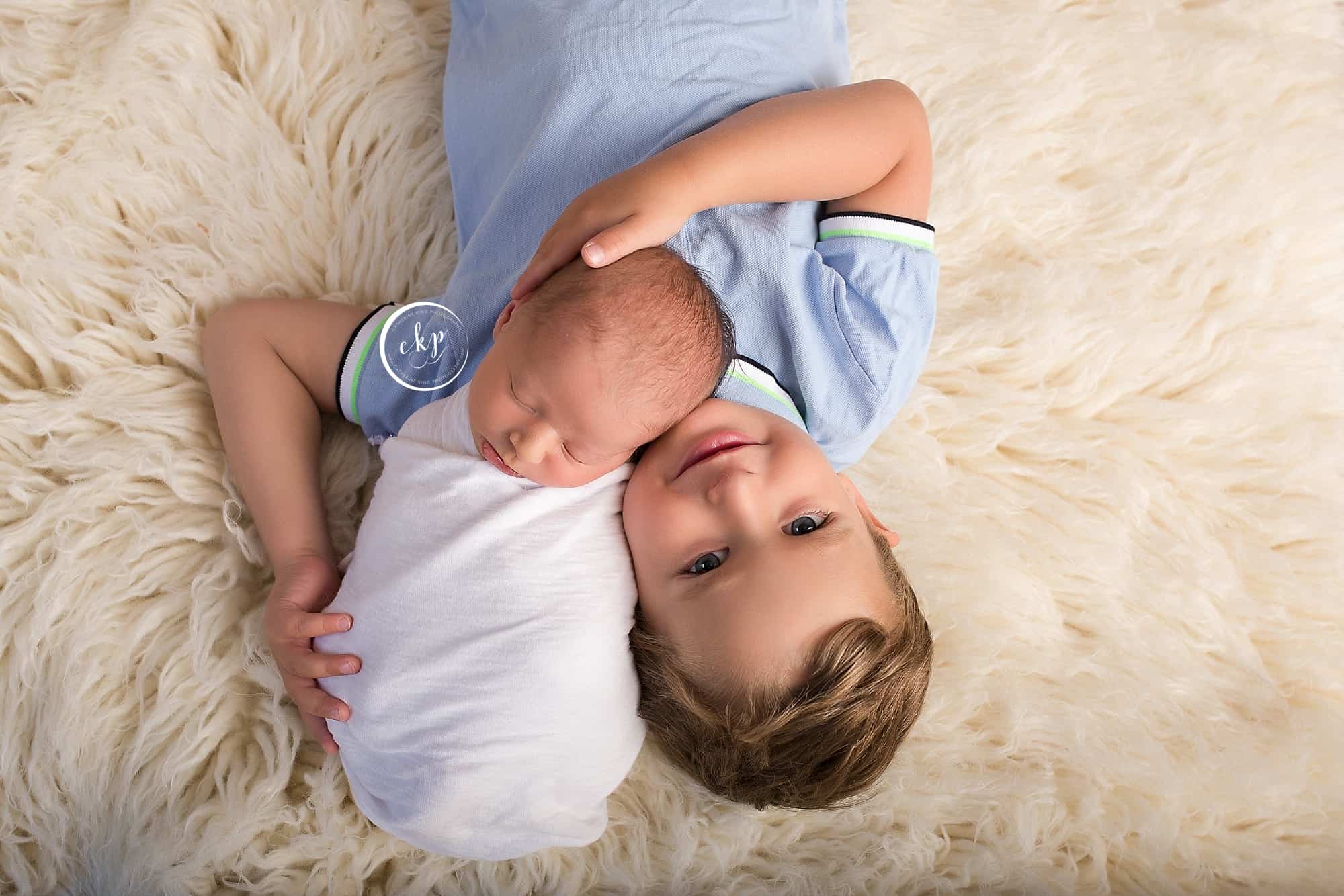 how to choose your newborn photographer