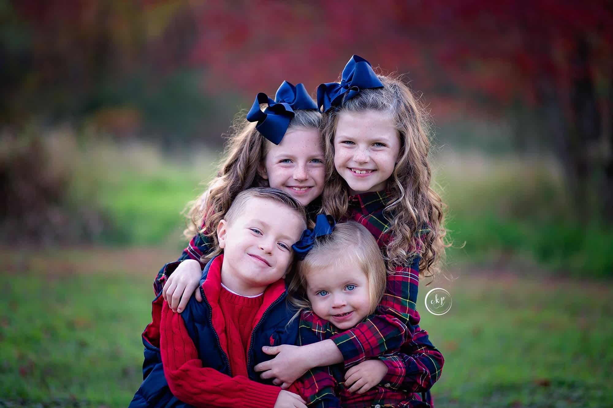 Fall family photography portraits in new england large family madison ct park foliage