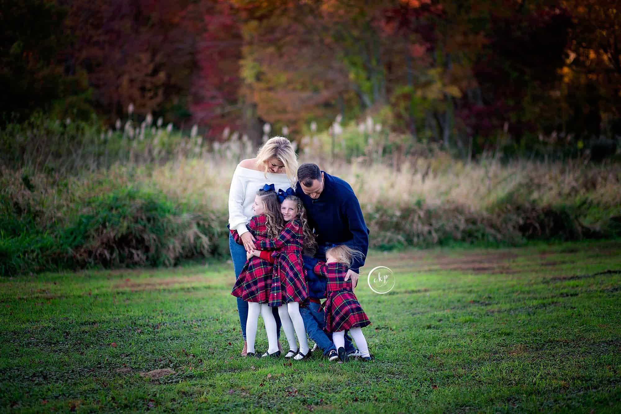 Fall family photography portraits in new england large family madison ct park foliage