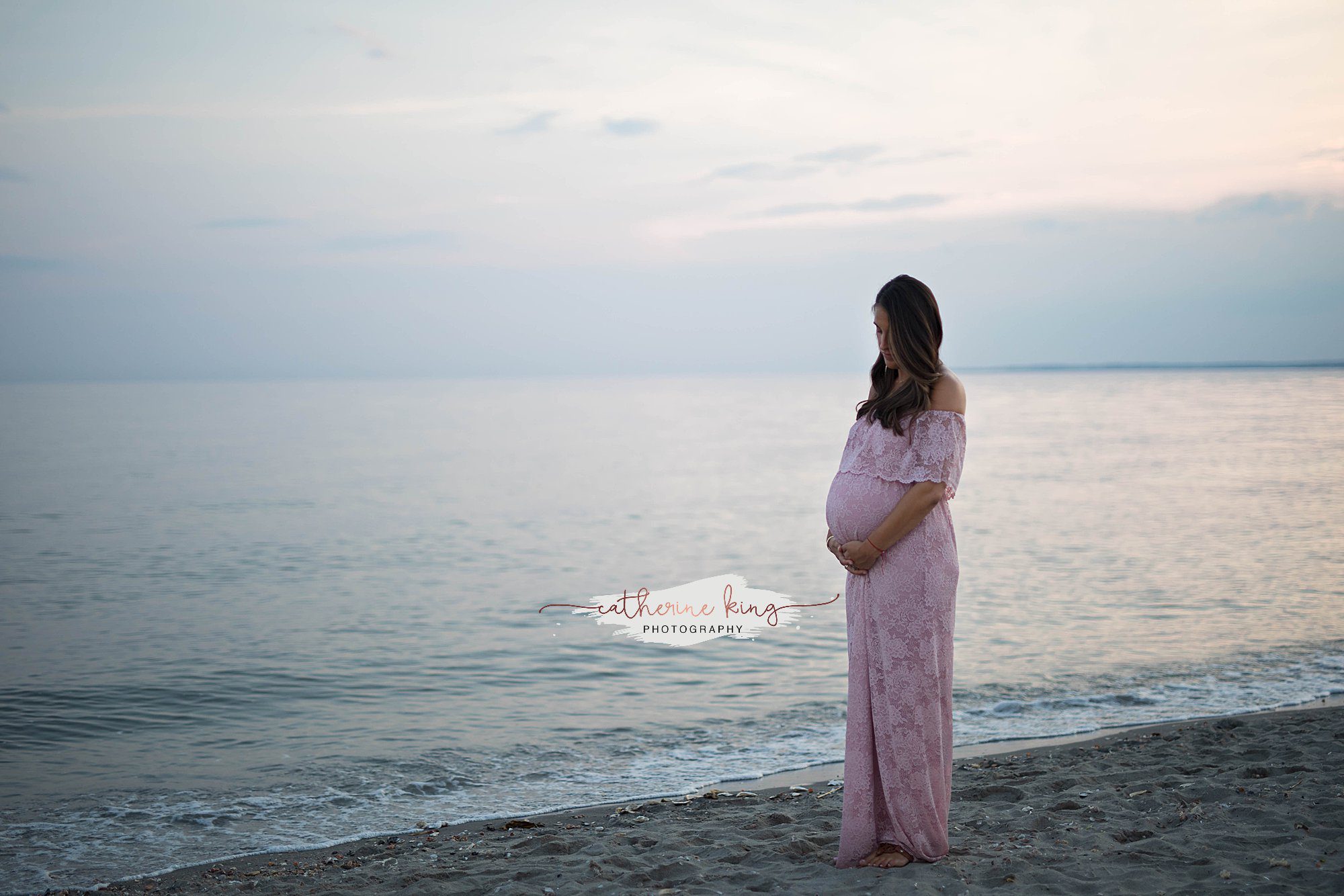 Sunset maternity session on the beach in Madison, CT