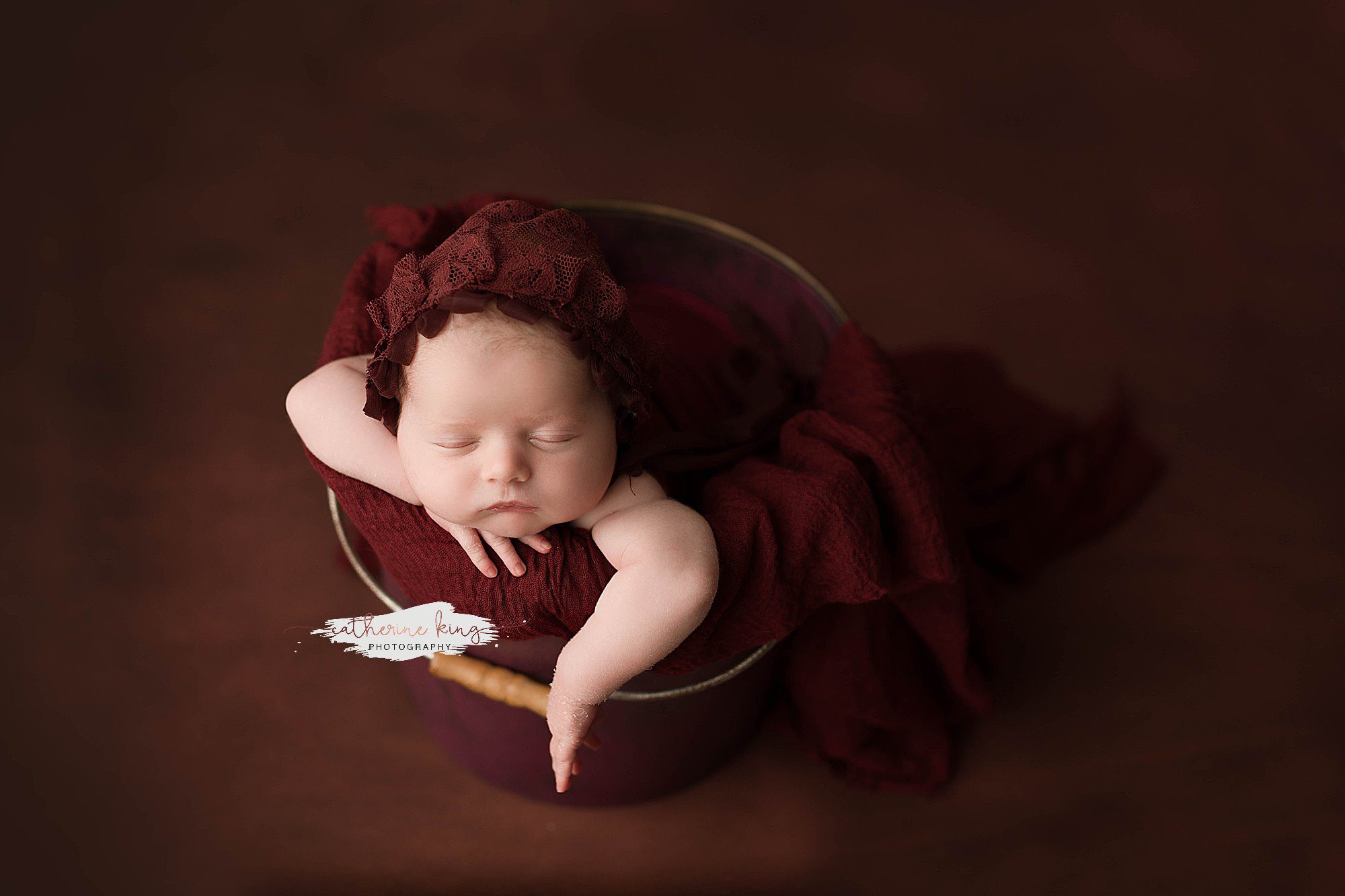 Incorporating bold rich colors into your Fall newborn photography session