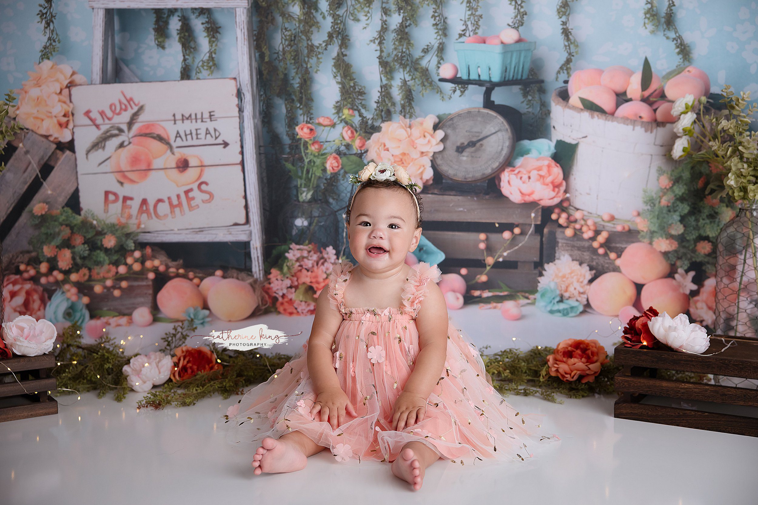 peach themed first birthday photoshoot