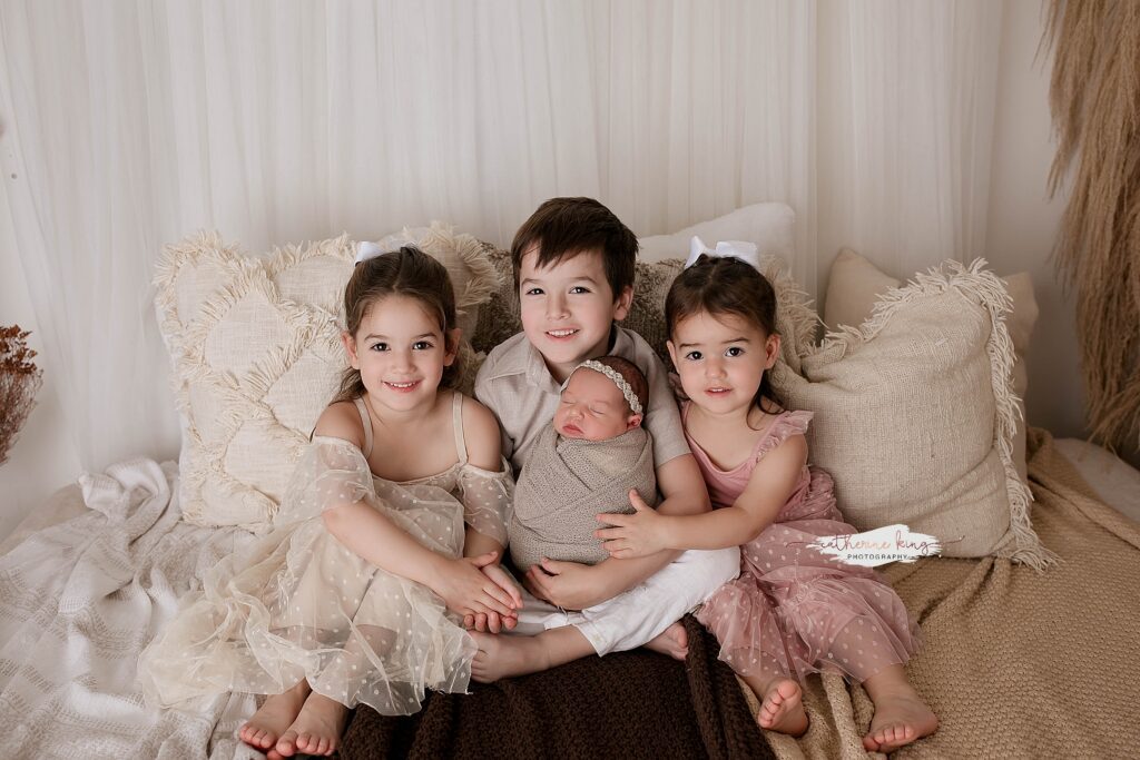 Madison CT maternity and newborn photographer — booking both sessions creates a cohesive story from bump to baby with consistent style throughout