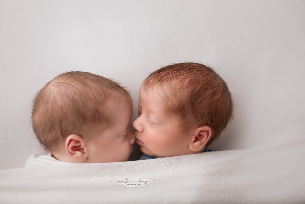 CT twin newborn photographer — twins naturally settle when placed close together, and those are often the most magical moments of the session.